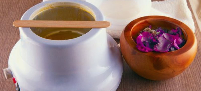 Hot wax and soothing cream for intimate waxing treatment at Clarity Health & Beauty.